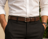 Leather belt on neutral backdrop